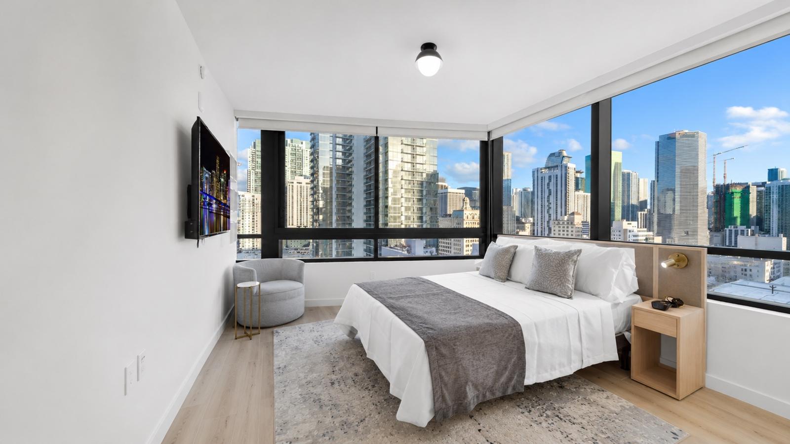 Bright Miami bedroom with downtown skyline