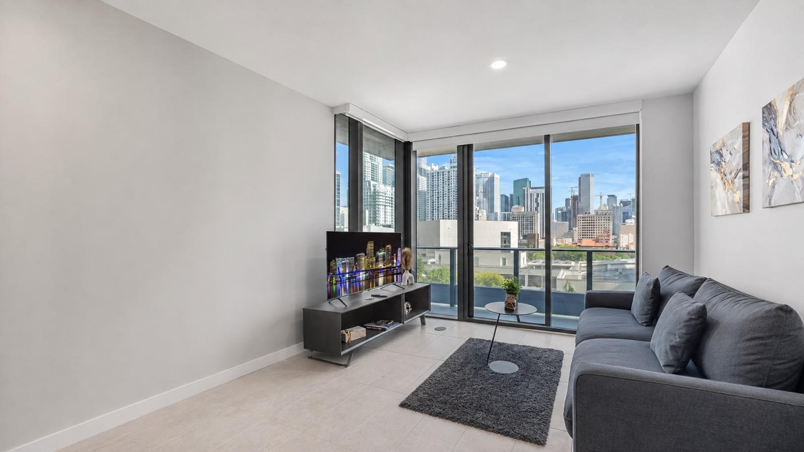 Downtown Miami living room with skyline